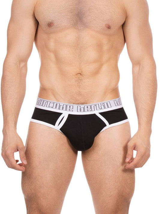 Man wearing black briefs with a brand logo on the waistband against a white background