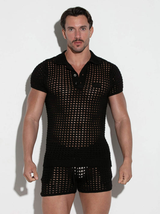 Man wearing a black mesh outfit on a white background