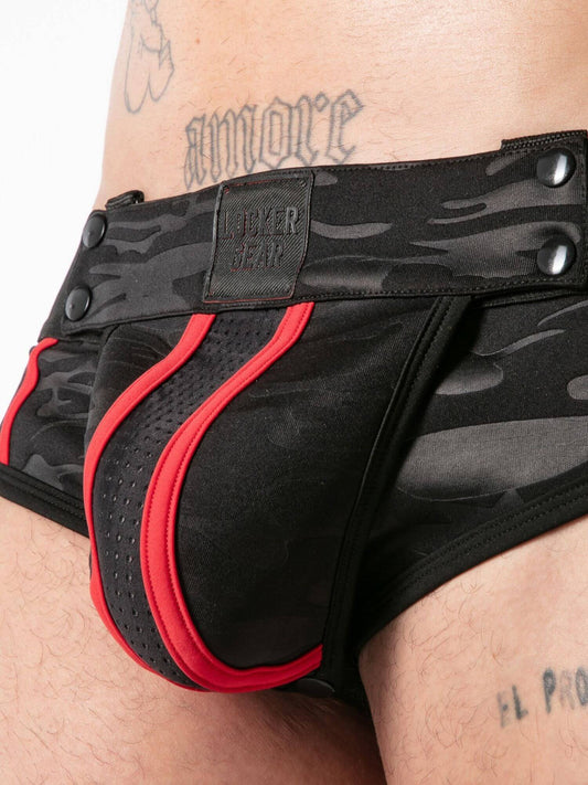 Black and red patterned underwear with 'Locker Gear' label on a person wearing it.