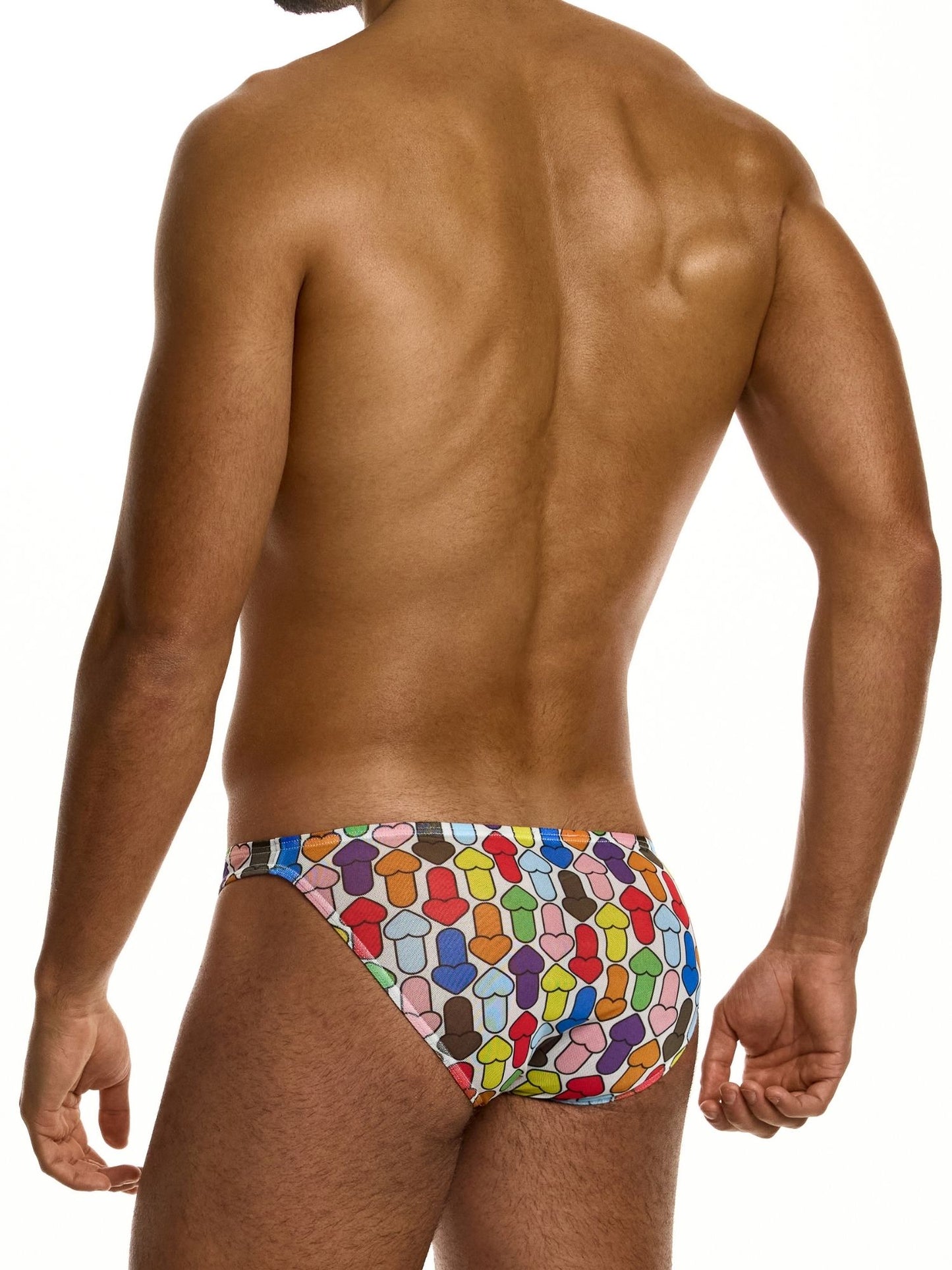 Man wearing colorful geometric patterned see-through mesh low rise brief on a white background