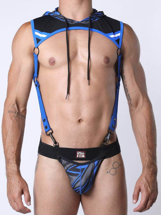 Man wearing a blue and black harness against a white background