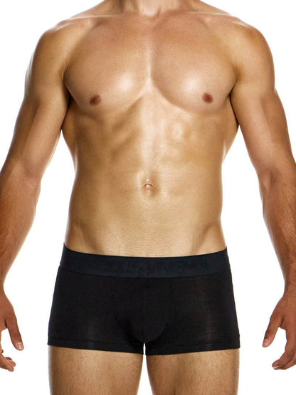 A model wearing green Modus Vivendi bamboo boxer briefs with a low-rise waistband and branded waistband.