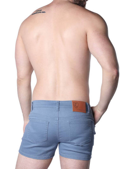 A pair of green Timoteo Berkeley cotton twill pocket shorts with a logo branding on the waistband, featuring a mid-thigh length, low-rise waist, zip-up fly, button fastening, belt loops, and five pockets.