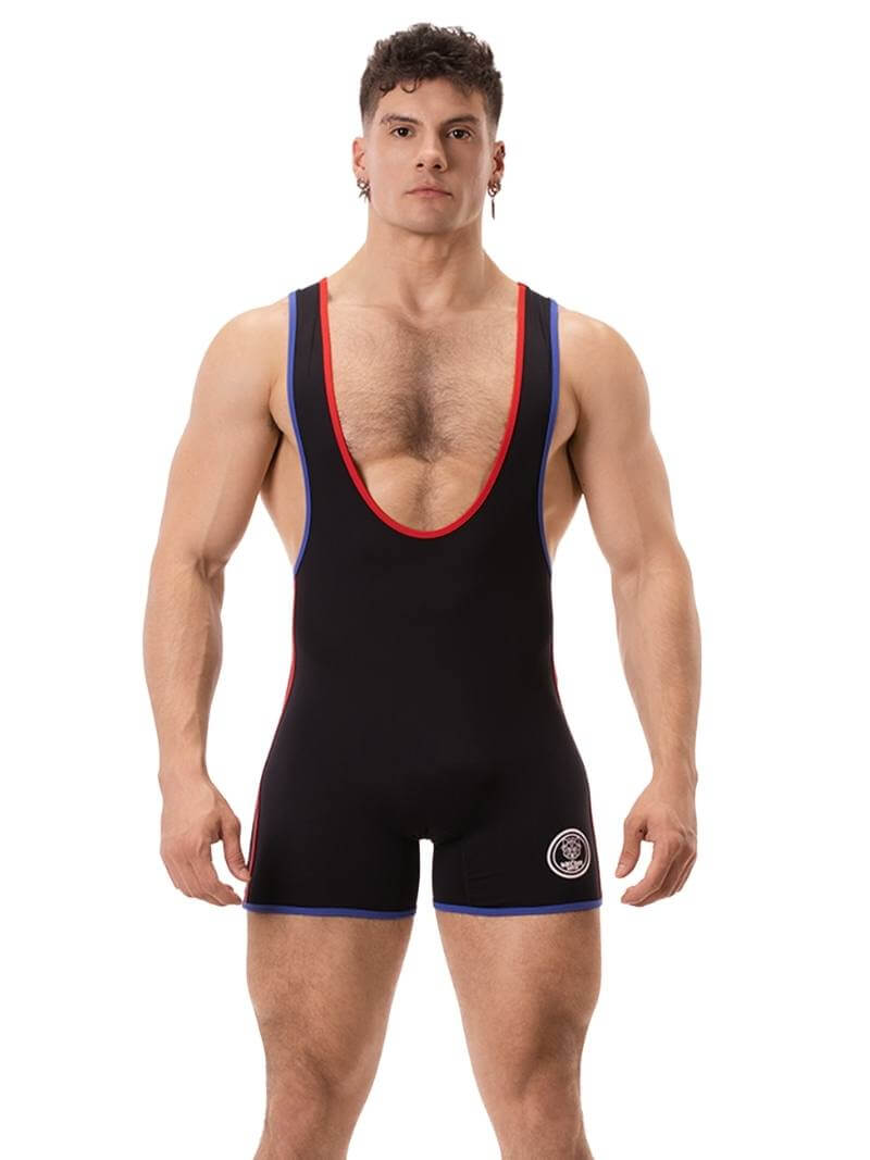 A person wearing a black wrestling singlet with Barcode Berlin branding on the left leg, featuring sporty side stripes.