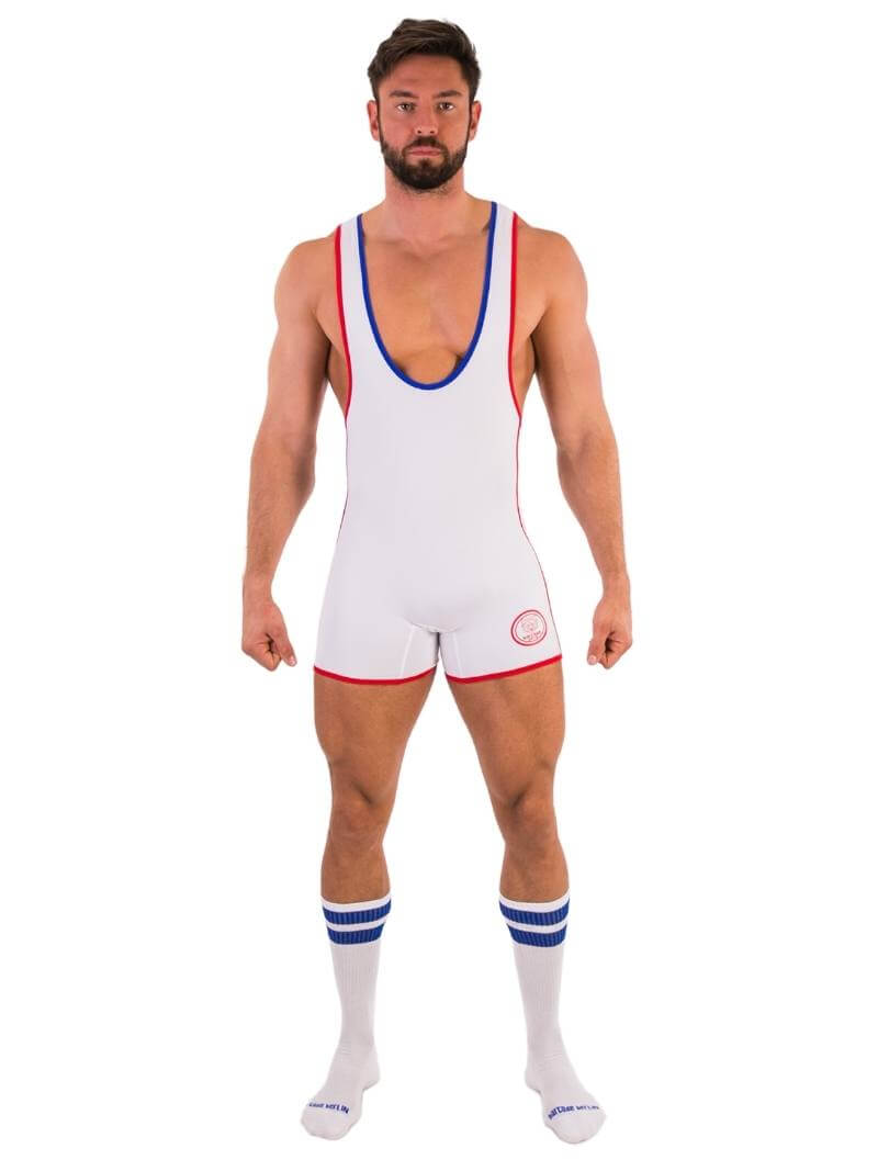A person wearing a black wrestling singlet with Barcode Berlin branding on the left leg, featuring sporty side stripes.