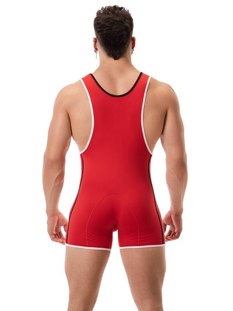 A person wearing a black wrestling singlet with Barcode Berlin branding on the left leg, featuring sporty side stripes.