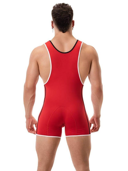 A person wearing a black wrestling singlet with Barcode Berlin branding on the left leg, featuring sporty side stripes.