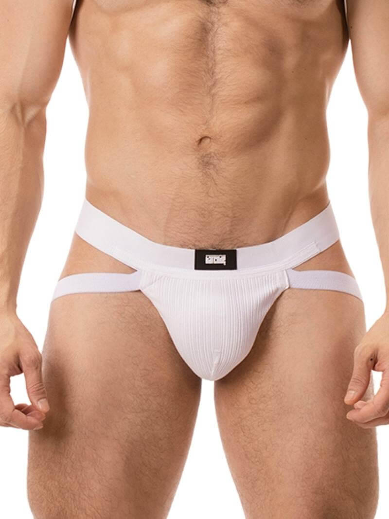 A white ribbed cotton butt lifting jockstrap by Barcode Berlin, featuring a sturdy thick waistband and elasticated jock straps, modelled by a male model.