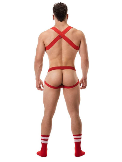 A white ribbed cotton butt lifting jockstrap by Barcode Berlin, featuring a sturdy thick waistband and elasticated jock straps, modelled by a male model.