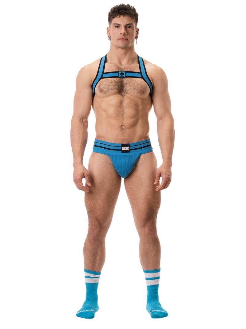 This image features the Barcode Berlin Andreus Jockstrap, showcasing its vibrant and bold design in a blue colour. The jockstrap has a classic sports jockstrap look with a wide, sturdy elastic waistband that carries a prominent Barcode Berlin brand label.