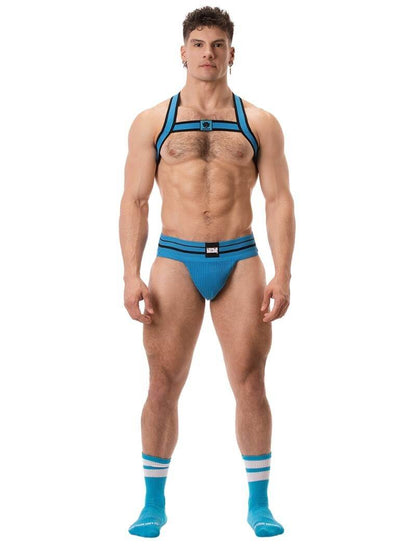 This image features the Barcode Berlin Andreus Jockstrap, showcasing its vibrant and bold design in a blue colour. The jockstrap has a classic sports jockstrap look with a wide, sturdy elastic waistband that carries a prominent Barcode Berlin brand label.