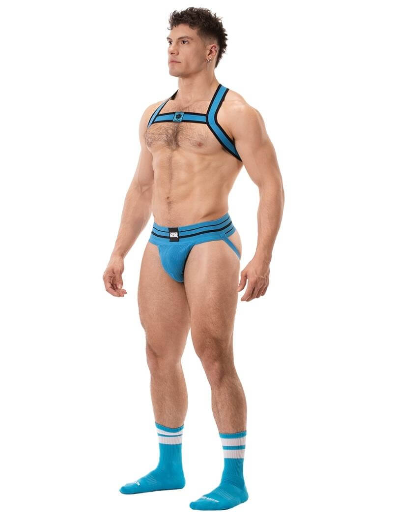 This image features the Barcode Berlin Andreus Jockstrap, showcasing its vibrant and bold design in a blue colour. The jockstrap has a classic sports jockstrap look with a wide, sturdy elastic waistband that carries a prominent Barcode Berlin brand label.