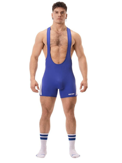 A man wearing a red Barcode Berlin backless singlet with white stripes and a low-cut neck.
