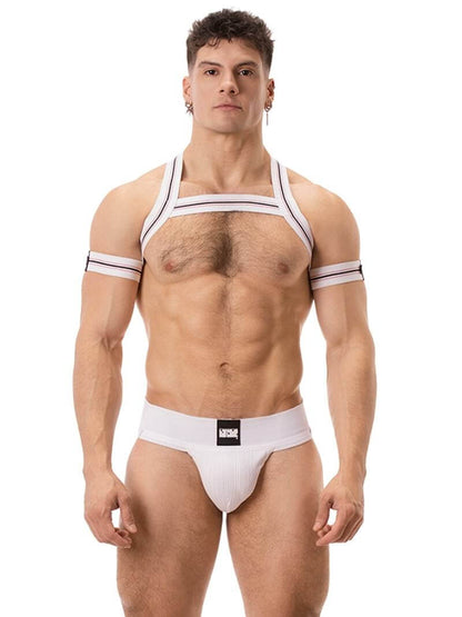 A model wearing a blue Barcode Berlin Sergey ribbed cotton jockstrap, with the brand label visible on the waistband.