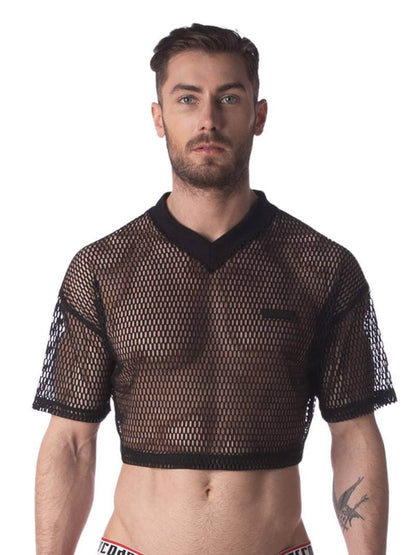 A male model wearing a black semi-see-through mesh fishnet crop top with short sleeves and a v-neck, branded with 'BARCODE'.