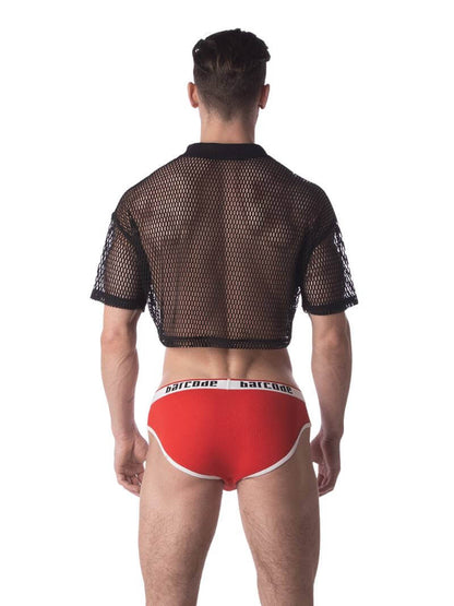 A male model wearing a black semi-see-through mesh fishnet crop top with short sleeves and a v-neck, branded with 'BARCODE'.