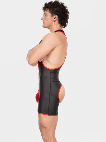 Person wearing a black swimsuit with red accents on a white background
