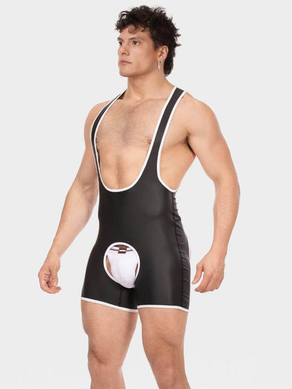Person wearing a black wrestling singlet with a logo on a white background