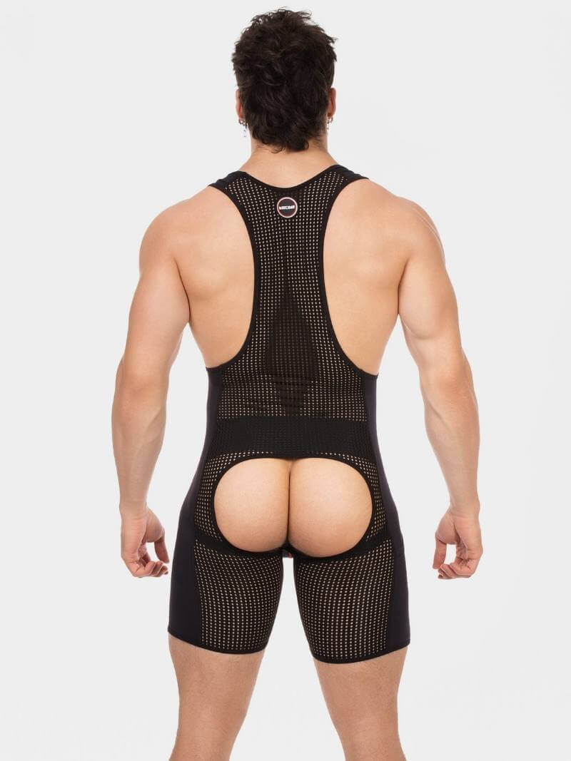 Person wearing a black mesh athletic outfit on a white background