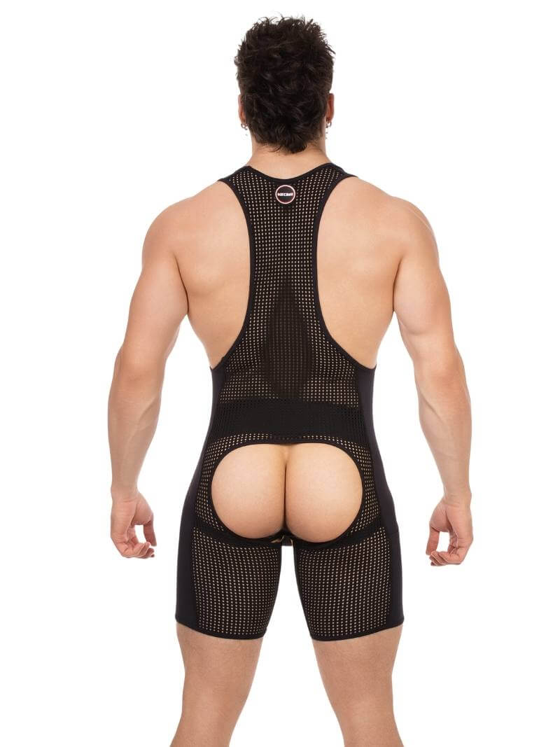 Person wearing a black mesh romper on a white background
