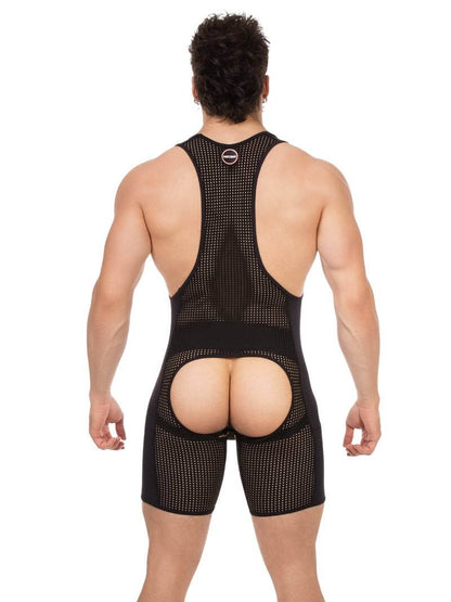 Person wearing a black mesh romper on a white background