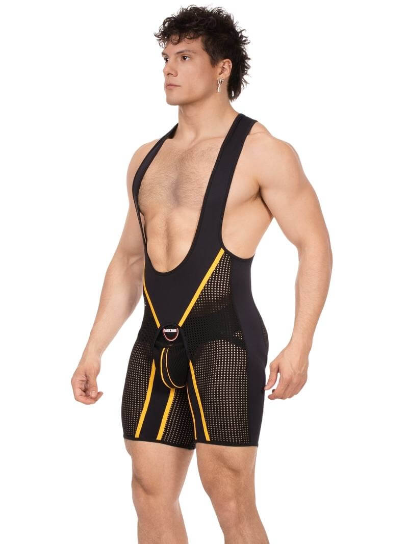 Man wearing a black and yellow compression garment on a white background