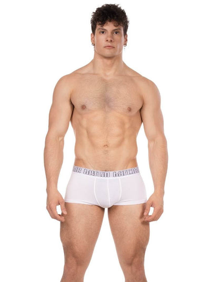 Man wearing white boxer briefs on a white background