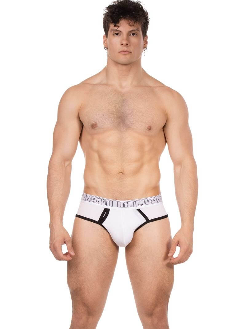 Man wearing white underwear with a plain background