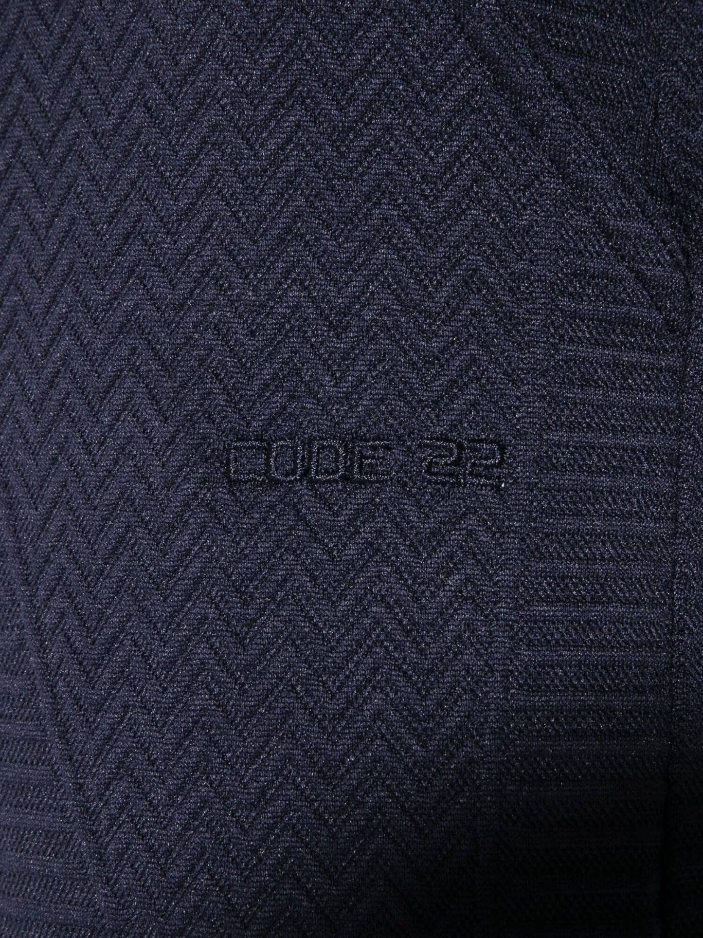 Navy blue textured fabric with 'CODE 22' branding.