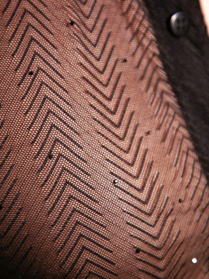 Close-up of sheer black shirt with a herringbone pattern