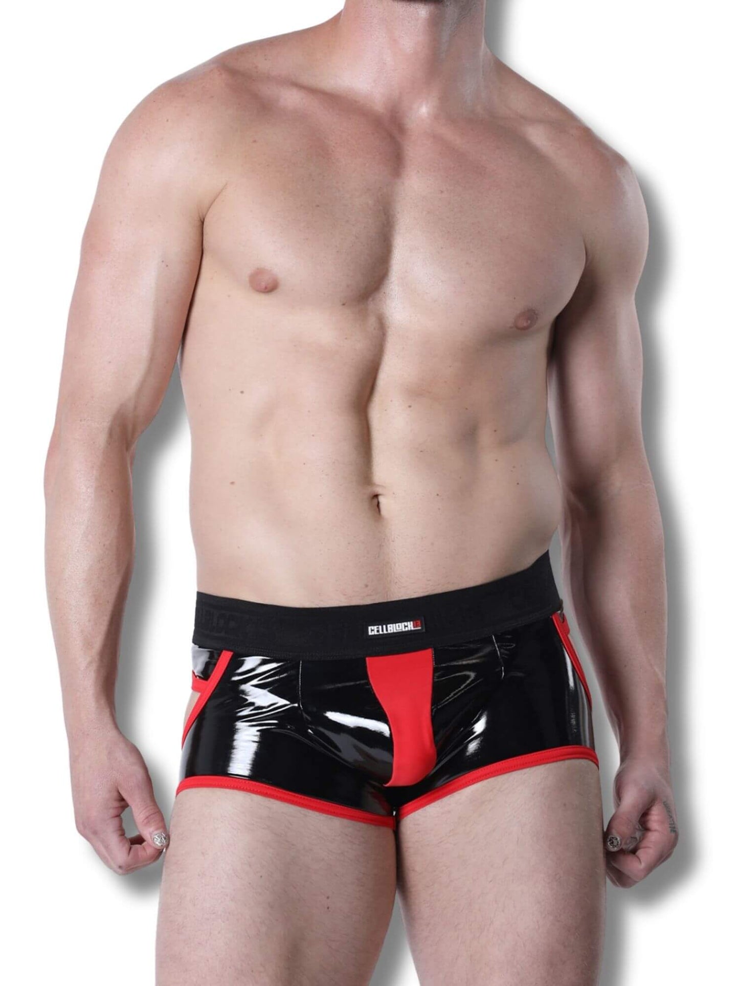 Man wearing black and red jock trunk on a white background