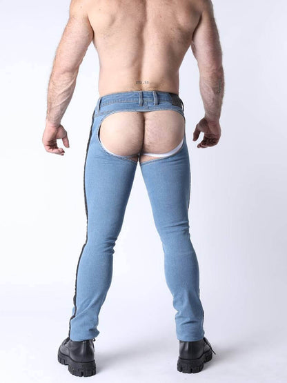 Person wearing light blue jeans with a sheer lining on a white background