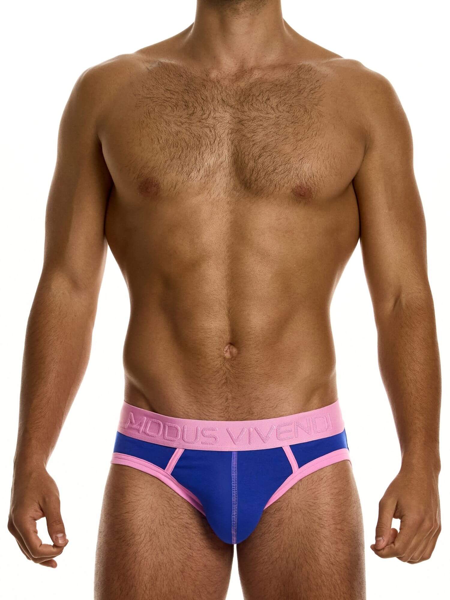 Man wearing blue and pink underwear with 'Mous Viver' branding on a white background