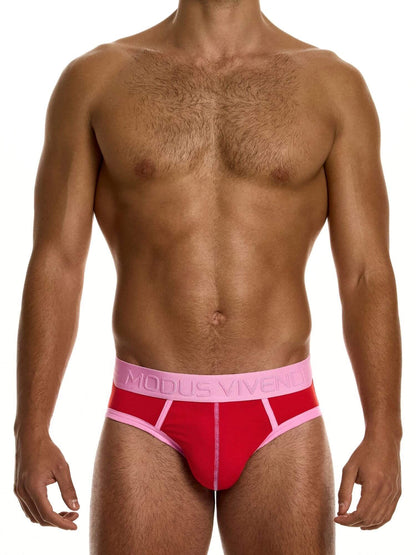 Man wearing a red and pink underwear with 'Modus Vivendi' branding on a white background