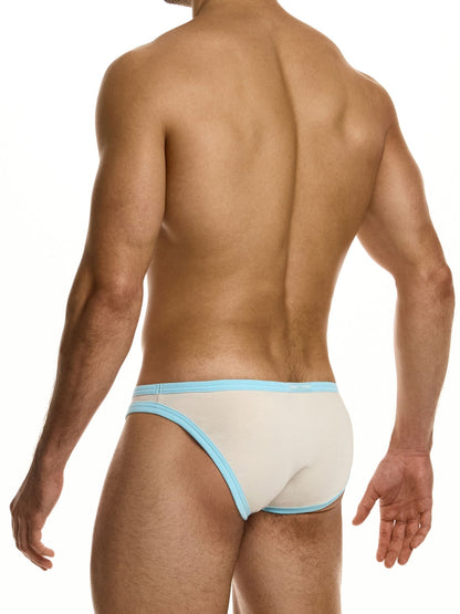 Man wearing a light blue and beige men's underwear set on a white background