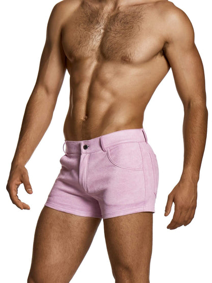 Man wearing pink mini shorts on a white background