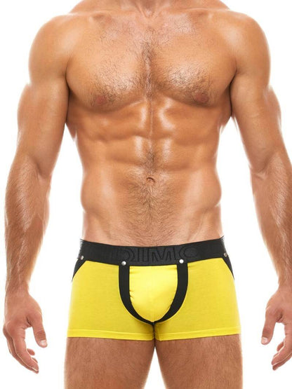 A model wearing a red and white Modus Vivendi Double Boost boxer brief with a waistband and front pouch straps.