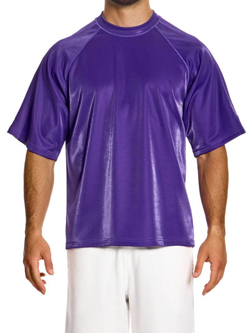 A male model wearing an oversized orange t-shirt with a rounded neck and a rubberized Modus Vivendi label on the back.