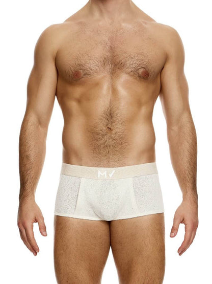 A model wearing a plain knit boxer brief with a wide elastic waistband.