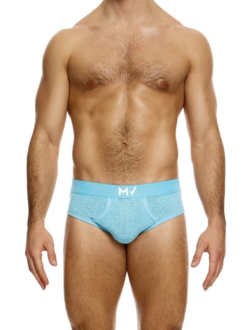 This image features the MODUS VIVENDI Plain Knit Classic Brief in a vibrant pink color. The brief showcases a fine knit texture made from a blend of polyester and cotton, ensuring both comfort and durability.