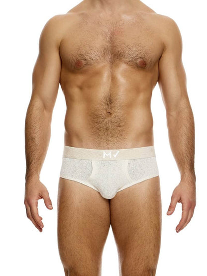 This image features the MODUS VIVENDI Plain Knit Classic Brief in a vibrant pink color. The brief showcases a fine knit texture made from a blend of polyester and cotton, ensuring both comfort and durability.