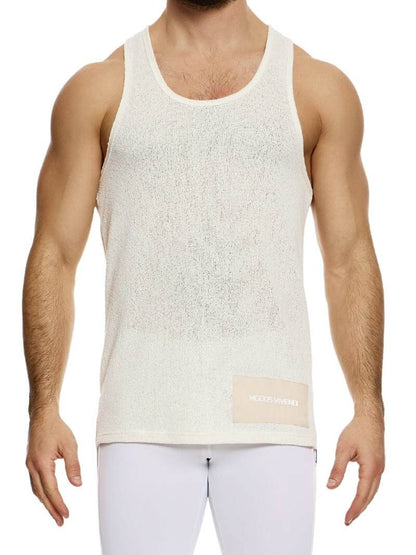 A male model wearing a long-length, round scoop neck, racer back, and straight fit pink knitted tank top with a linen panel on the back.