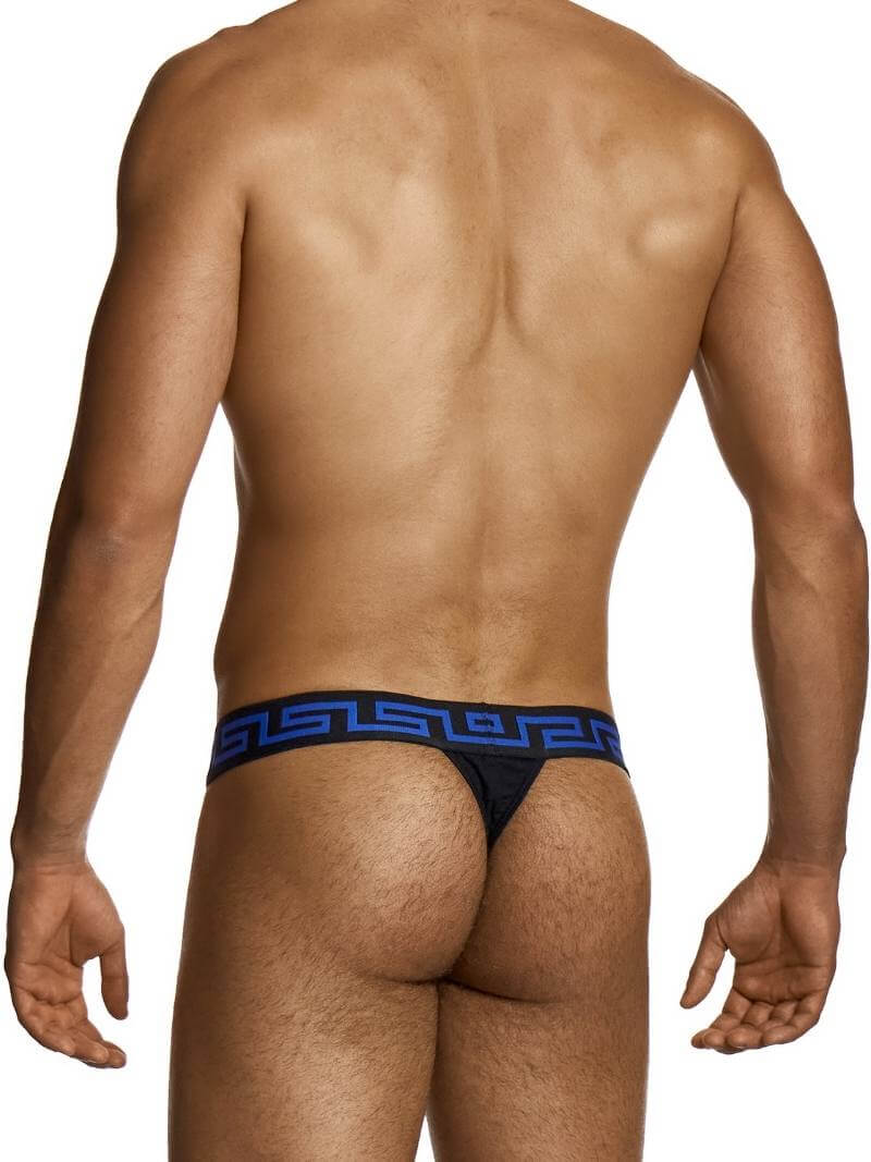 Man wearing a black and blue men's underwear on a white background