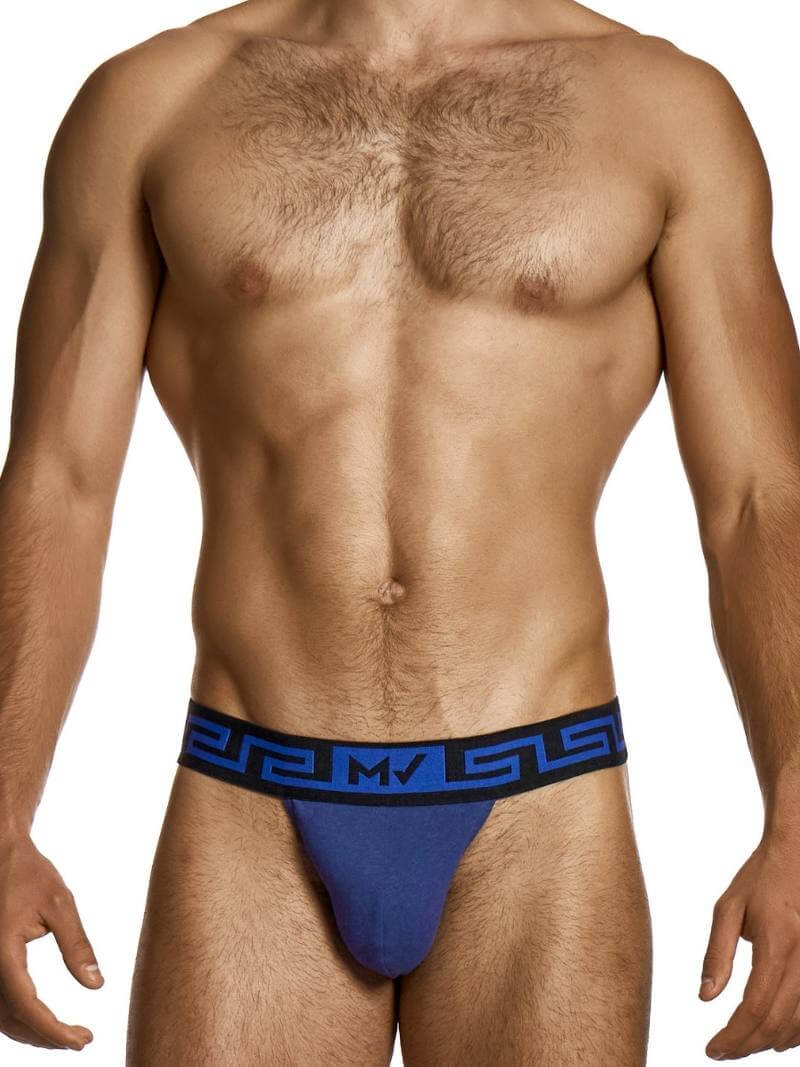 Man wearing a blue men's underwear with a black waistband on a white background