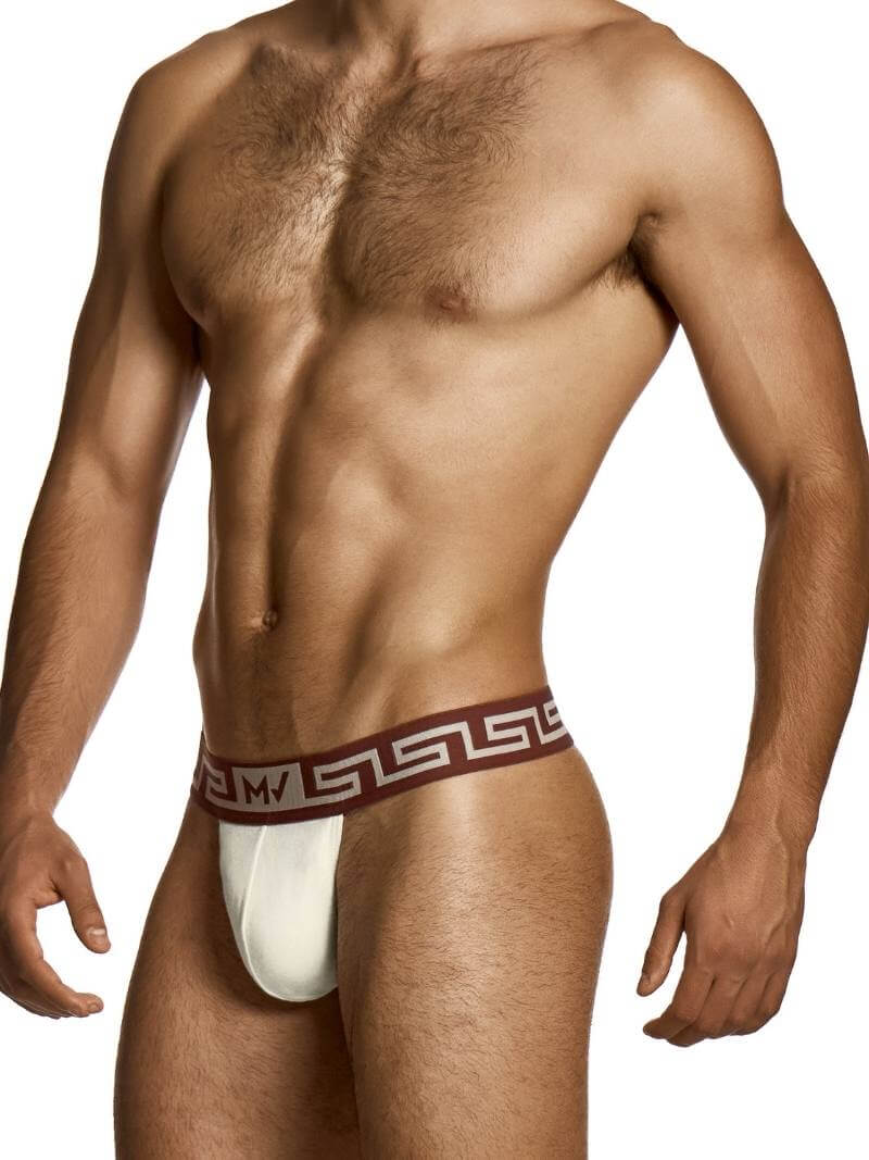 Man wearing a white athletic supporter with a red and white waistband on a white background