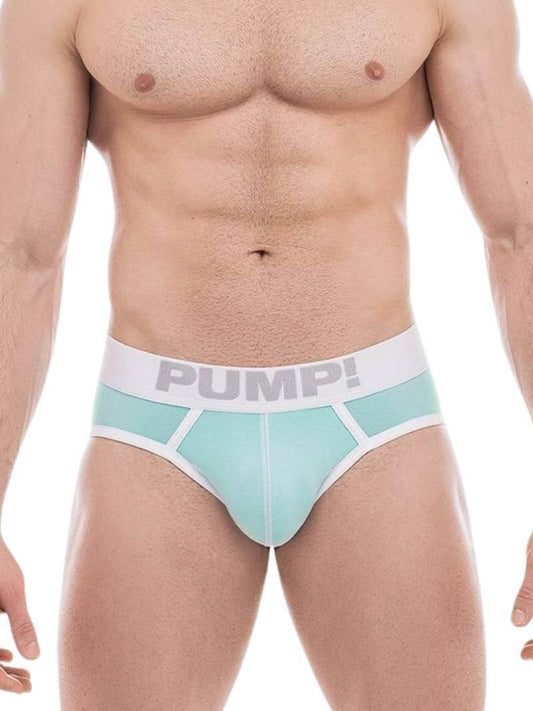 A model wearing a purple PUMP Underwear Milkshake Cotton Brief with white stitching and a contoured pouch.
