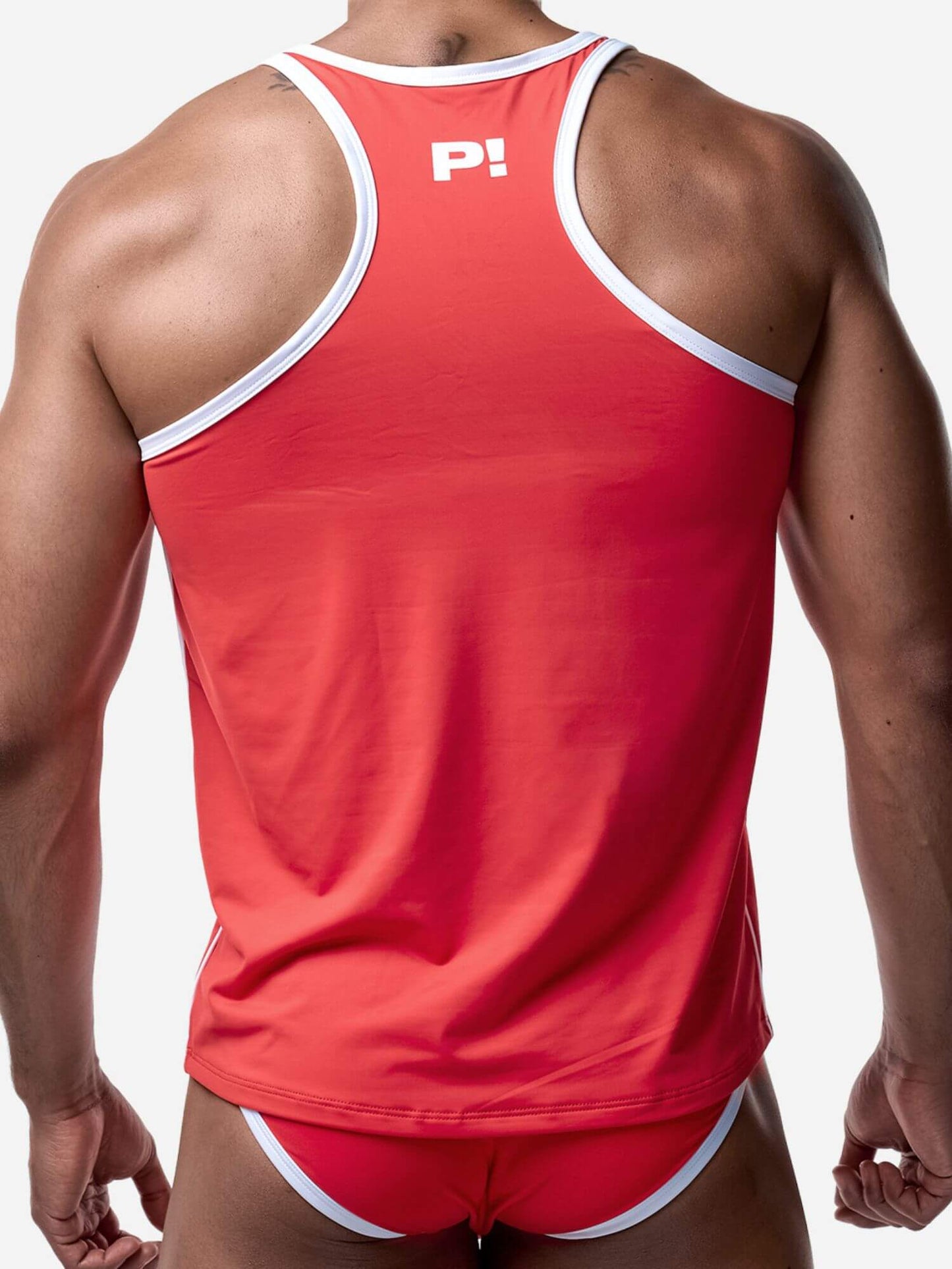 Red tank top with white trim worn by a person on a plain background