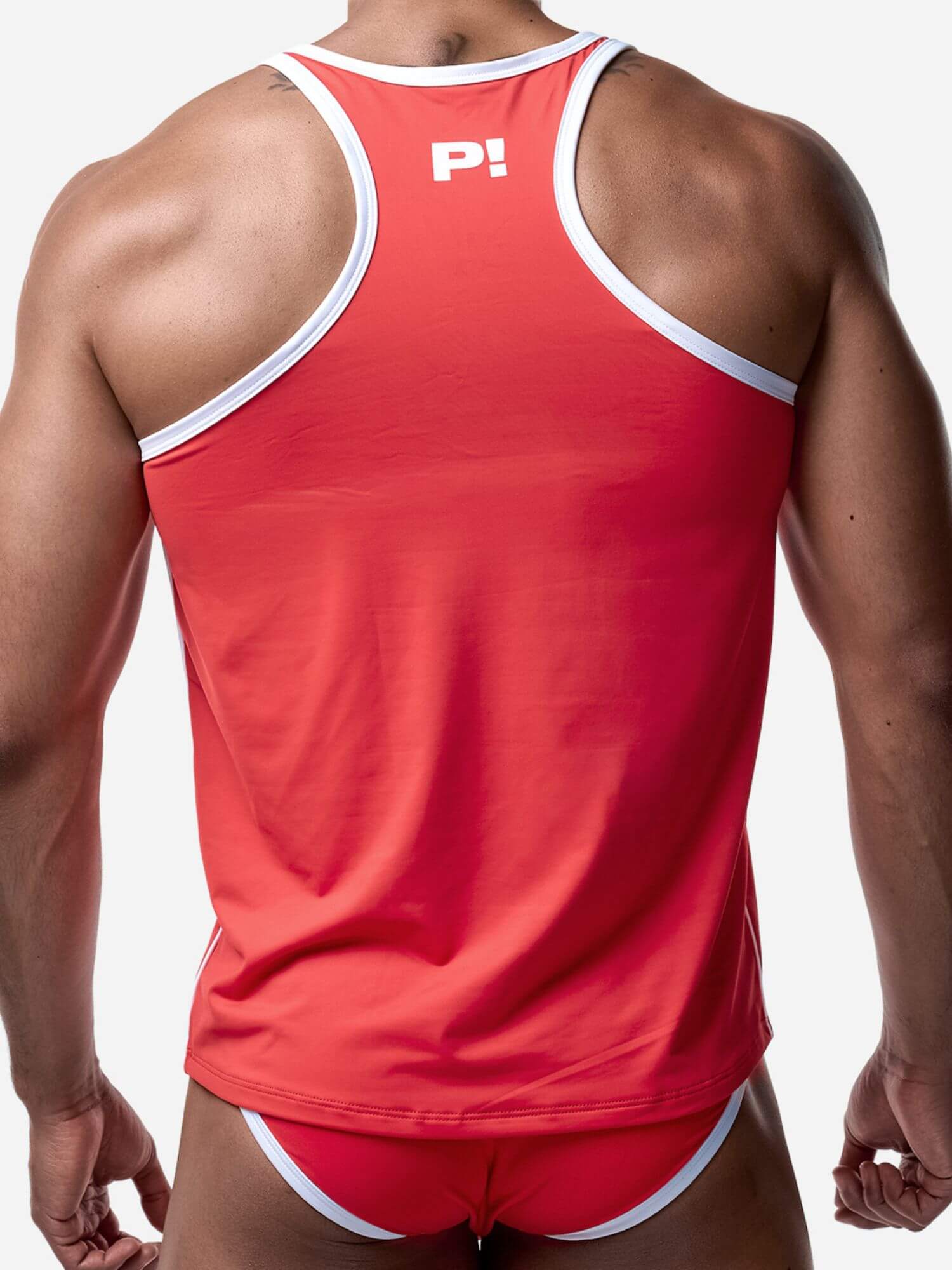 Red tank top with white trim worn by a person on a plain background