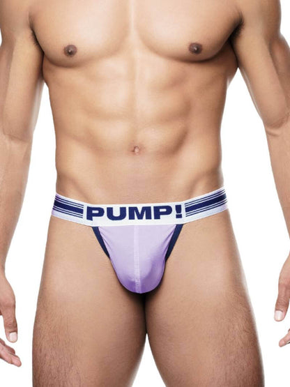 This image features the PUMP Underwear Bloom Thong, showcasing a vibrant and stylish design. The thong has a lavender front cup with contrasting navy trim piping and white stitching, adding a touch of elegance and detail.