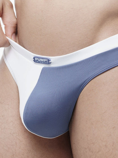 Blue and white men's swim thiong with a visible brand logo on a plain background